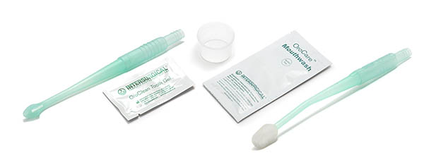 Kit OroCare con colutorio con Clorhexidina y gel dentífrico, cepillo OroCare Aspire con aspiración, torunda OroCare Sensitive con aspiración y taza dispensadora 